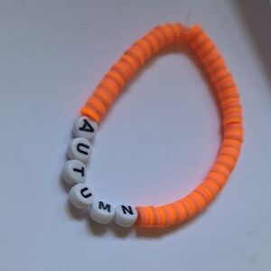 Orange and White Beaded Bracelet